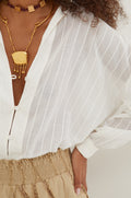 gid://shopify/Product/9596063809757